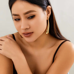 Never The Less Oversized Tear Earrings