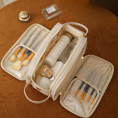 VanityVaultâ„?- Triple charm makeup bag