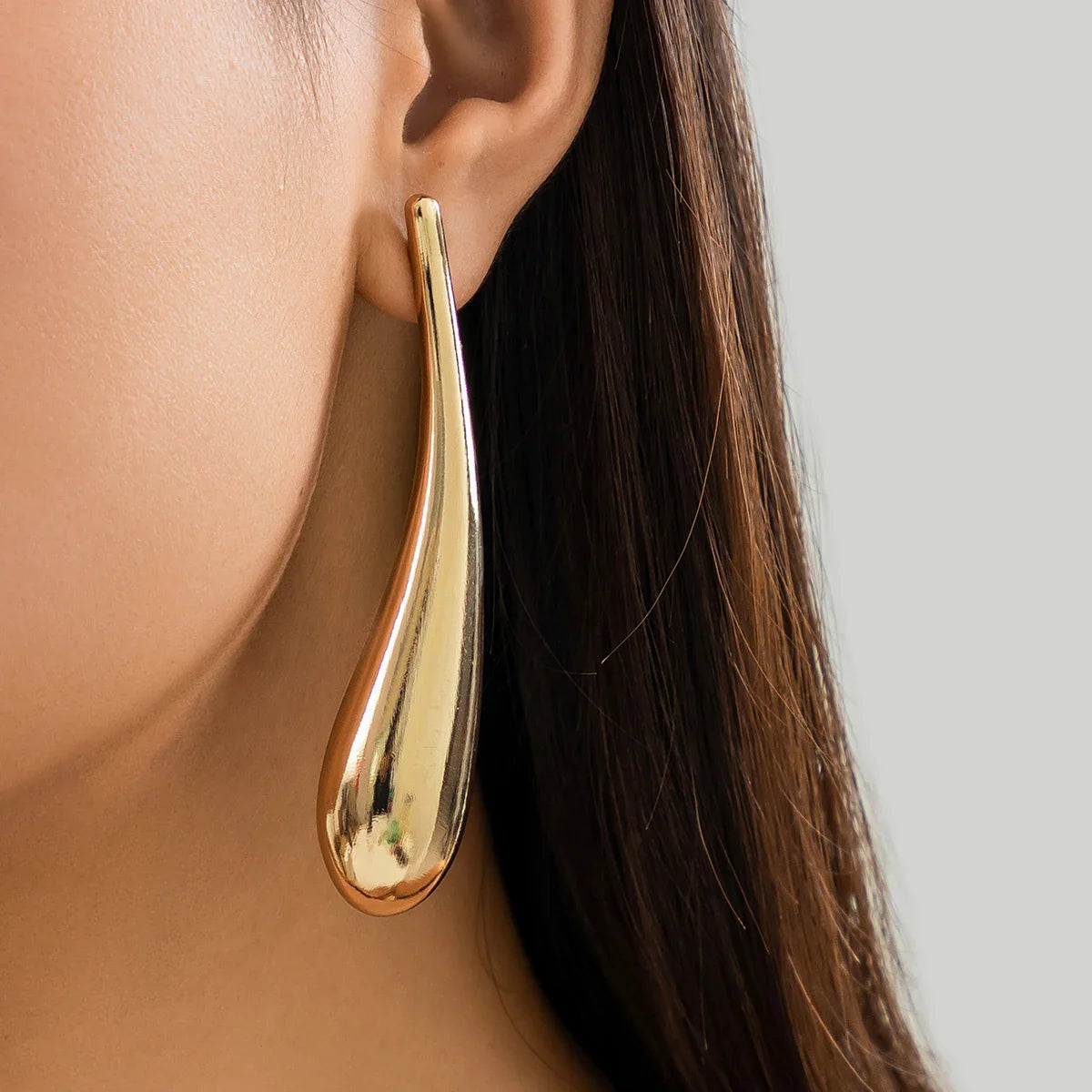 Never The Less Oversized Tear Earrings