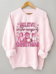 Believe In The Magic Of Christmas pink snowman print sweatshirt